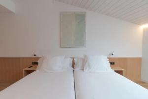 Postel nebo postele na pokoji v ubytování Hotel Cortabitarte
