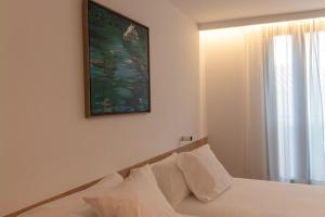 Postel nebo postele na pokoji v ubytování Hotel Cortabitarte