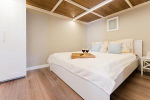 Posteľ alebo postele v izbe v ubytovaní Downtown Greenie Home + 15 fotografií