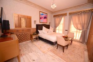 THE WHITE PALACE Rabat 객실 침대