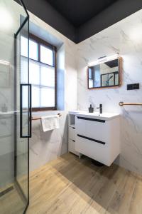 Kúpeľňa v ubytovaní Apartament Liściasty 1 z tarasem - Dream Apart + 28 fotografií