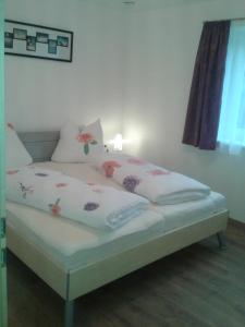 Кровать или кровати в номере Apart Silke
