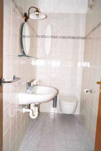 Kúpeľňa v ubytovaní Apartment Cascada - Alpstay