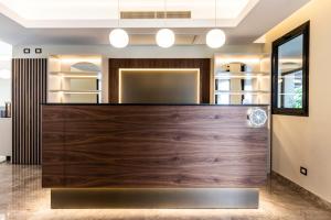 Лобби или стойка регистрации в Solmaris Tropea Rooms & Suites