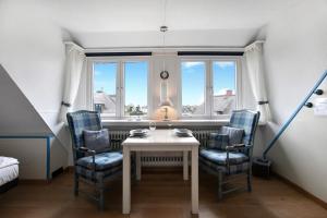 Posezení v ubytování Ferienwohnung Haus Lazy Dolphin