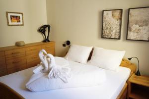 Posteľ alebo postele v izbe v ubytovaní Apartment Cascada - Alpstay