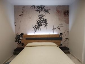 A bed or beds in a room at Valle dell'Eden