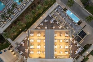 an overhead view of a building with people in a courtyard at Porto Platanias Beach Resort & Spa in Plataniás