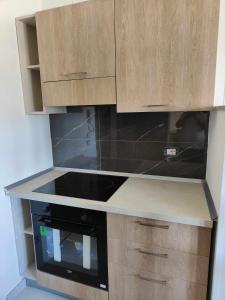 A kitchen or kitchenette at Fantasia B&B APARTAMENT STUDIO