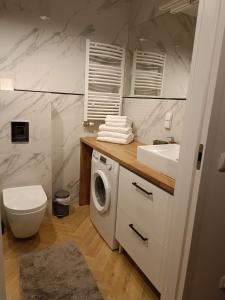 Kúpeľňa v ubytovaní Apartament z Ogrodem Gdansk Przymorze