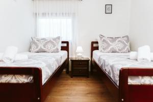 Tempat tidur dalam kamar di Hotel Medjugorje Irish Centre