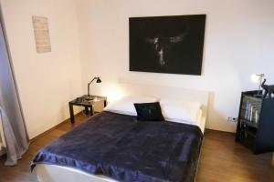 Ein Bett oder Betten in einem Zimmer der Unterkunft Ferienwohnungen Zinnowitz