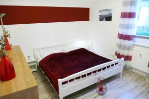Ein Bett oder Betten in einem Zimmer der Unterkunft Ferienwohnungen Zinnowitz