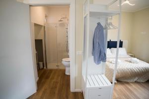 Postel nebo postele na pokoji v ubytování Balconi Del Conero