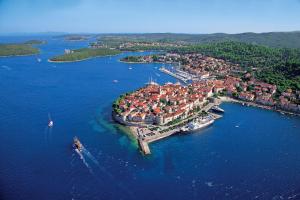 an aerial view of a small island in the water at Apartment Villa Green Court in Korčula