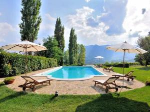 The swimming pool at or close to Villa Collepere Country House