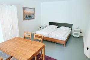 Ein Bett oder Betten in einem Zimmer der Unterkunft Ferienwohnungen Zinnowitz