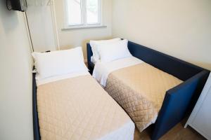 Postel nebo postele na pokoji v ubytování Balconi Del Conero