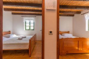 Posteľ alebo postele v izbe v ubytovaní House Jure