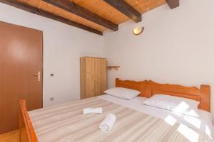 Posteľ alebo postele v izbe v ubytovaní House Jure