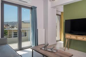 TV a/nebo společenská místnost v ubytování Aromi Apartments