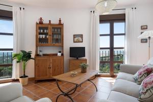 A television and/or entertainment centre at Cobijadas75 Mayorazgo