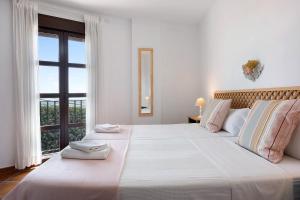 A bed or beds in a room at Cobijadas75 Mayorazgo