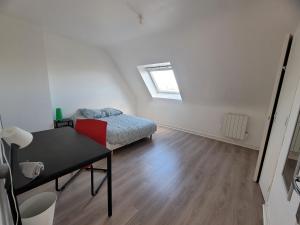 Posteľ alebo postele v izbe v ubytovaní Maison de ville avec 4 grandes chambres