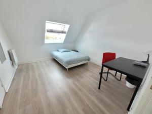 Posteľ alebo postele v izbe v ubytovaní Maison de ville avec 4 grandes chambres