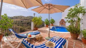 The swimming pool at or close to Apartamento Mirasierra 2 Frigiliana by Ruralidays