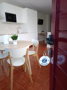 Кухня или мини-кухня в Apartamentos Marina
