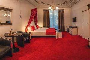 Postel nebo postele na pokoji v ubytování Grand Hotel Bellevue - adults only
