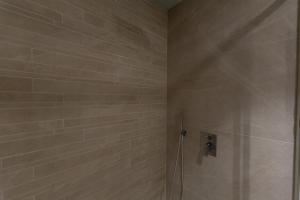 Koupelna v ubytování DiVino Rooms Deluxe