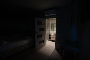 Postel nebo postele na pokoji v ubytování DiVino Rooms Deluxe