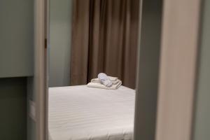 Postel nebo postele na pokoji v ubytování DiVino Rooms Deluxe