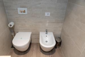 Koupelna v ubytování DiVino Rooms Deluxe