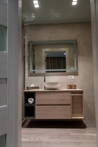 Koupelna v ubytování DiVino Rooms Deluxe