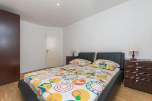 Posteľ alebo postele v izbe v ubytovaní Apartment Marijo