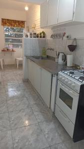 Kjøkken eller kjøkkenkrok på Ona Apart por Día - Departamentos con cochera