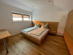 Postel nebo postele na pokoji v ubytování Das Haus am Anger
