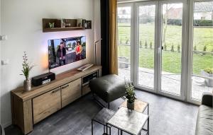 TV a/nebo společenská místnost v ubytování Seeschwalbe
