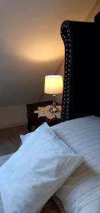 Postel nebo postele na pokoji v ubytování Lux Apartman Villa