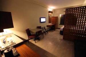 A television and/or entertainment centre at Microtel by Wyndham UP Technohub