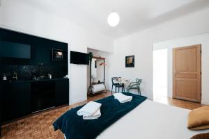 Posteľ alebo postele v izbe v ubytovaní Les Précieuses Suites & Spa II