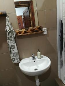 Koupelna v ubytování Garni