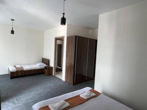 Postel nebo postele na pokoji v ubytování Guest House Nikola