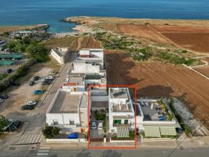 an aerial view of a house with a red rectangle at Le casette in Monopoli