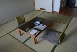Uma área de estar em Toya Kanko Hotel
