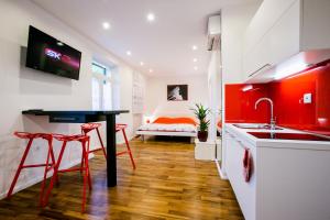 TV o dispositivi per l'intrattenimento presso Guesthouse Old Mulberry