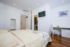 Letto o letti in una camera di Guesthouse Old Mulberry